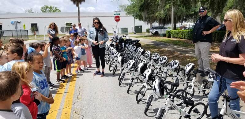 Flying Piston Benefit Donates Bikes to Ormond Beach Elementary